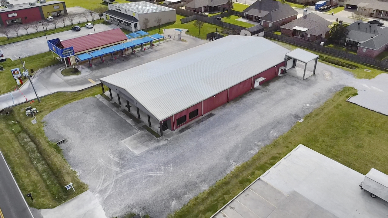 Aerial view of the 11,600 SF commercial building at 312 Westgate Road, Lafayette LA